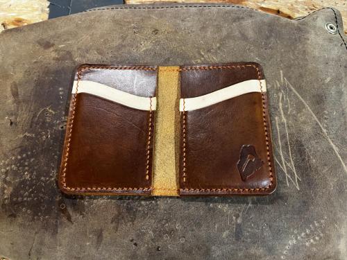 bi-fold portrait leather wallet open